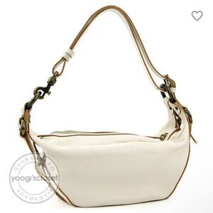 MARC JACOBS
Egg Shell Leather Turn-Lock Katie Shoulder Bag
Authentic